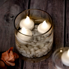 Load image into Gallery viewer, IMAGE 12 Pcs Warm White Floating Candles Flameless LED Tea Lights Tealight Candles