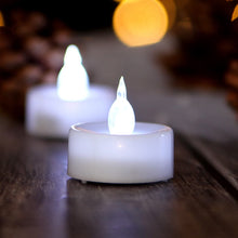 Load image into Gallery viewer, AGPtEK 24pcs Timer Flickering Flameless LED Candles Battery-Operated Tealights for Wedding Holiday Party Home Decoration (Cool White)