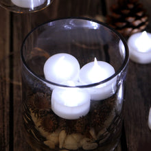 Load image into Gallery viewer, AGPtEK 24pcs Timer Flickering Flameless LED Candles Battery-Operated Tealights for Wedding Holiday Party Home Decoration (Cool White)