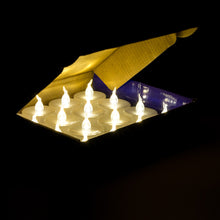 Load image into Gallery viewer, 100pcs LED Flickering Candles Tea Light Warm White Flameless Smokeless Flashing