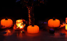 Load image into Gallery viewer, IMAGE 12 Packs LED Pumpkin Lights Battery Operated Pumpkin Tealight Candles for Halloween, Christmas, Thanksgiving and Theme Parties
