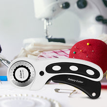 Load image into Gallery viewer, AGPtek 45mmRotary Cutter with 7 Replacement Rotary Blades &amp; Safety Lock for Precise Cutting Ideal for Sewing Fabric Leather Quilting &amp; More
