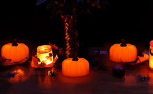 Load image into Gallery viewer, IMAGE 12 Packs LED Pumpkin Lights Battery Operated Pumpkin Tealight Candles for Halloween, Christmas, Thanksgiving and Theme Parties
